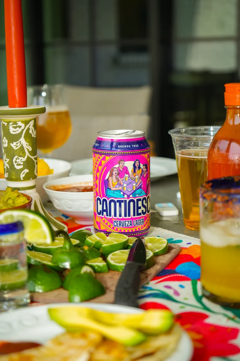 A table set with Cantinesca, limes and dishes ready to share