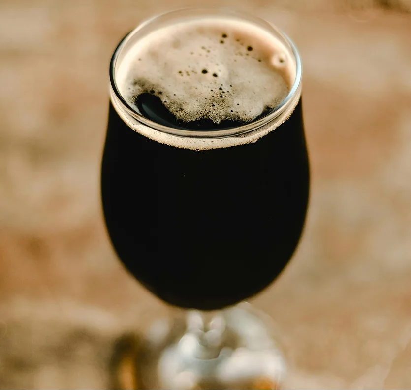 A freshly poured dark beer